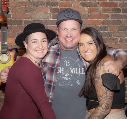 Garth Brooks, Agusut Anna, and Allie Colleen.