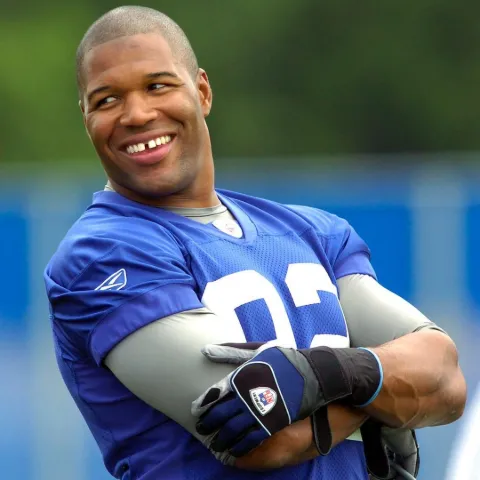 Michael Strahan in NY Giants' jersey.
