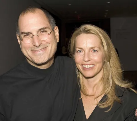Steve Jobs and Laurene Powell Jobs.