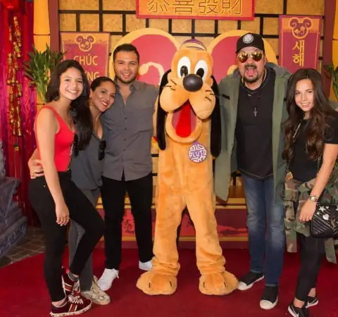 Aneliz Aguilar Alvarez with Her Husband and Kids at Disneyland. 