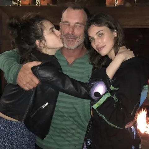 Paul Qualley with His Daughters. 