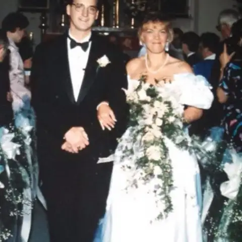 Jane Baldwin and Randy Sasso walked down the aisle. 