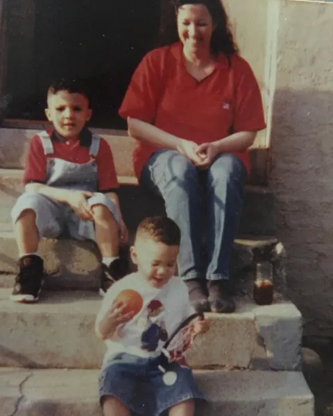 Veronica Gutierrez with Devon Wade and Devin Booker. 