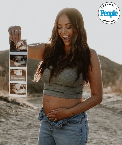 Kristen Doute showing off her baby bump